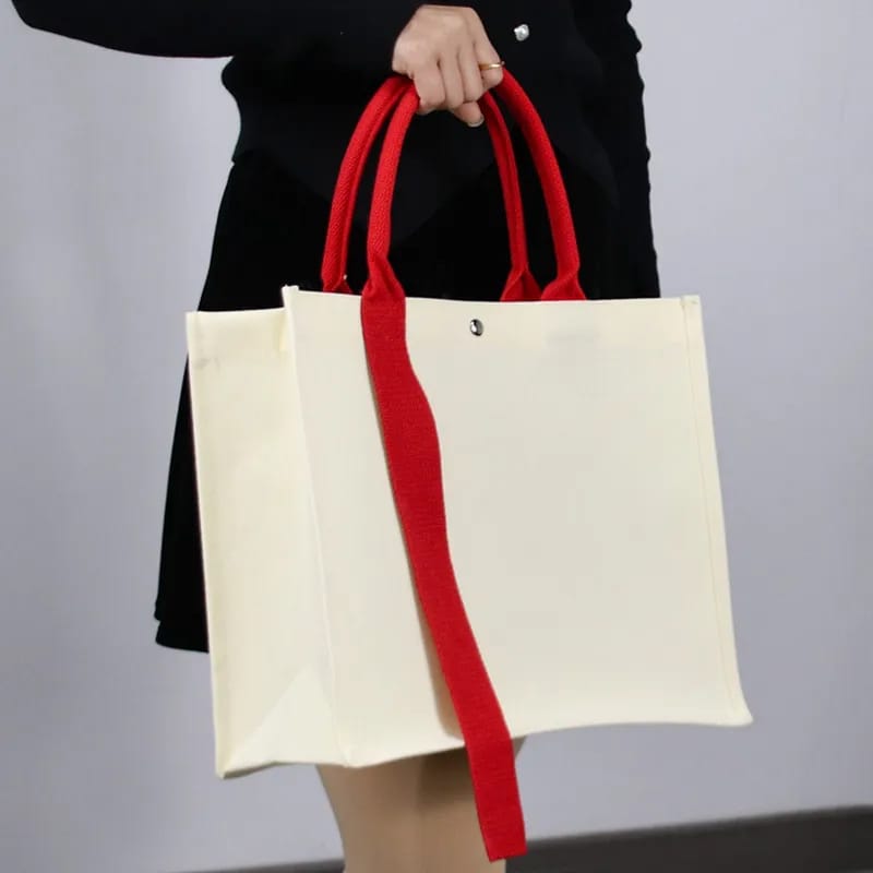 Bolsa en canvas con cinta 14x10.5